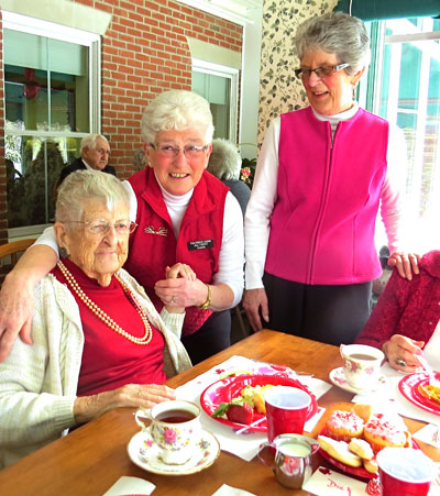 Members of "Friends of the Pierce" who always host all such fun occasions. Here celebrating with Leona Cross, 103, the oldest resident and former restaurant owner. (Photo by Jane Knox)
